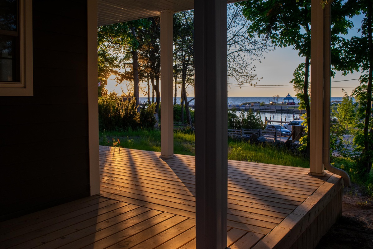     &ldquo;Golden sunset light spilling across the porch as another perfect Lake Huron evening begins.&rdquo;