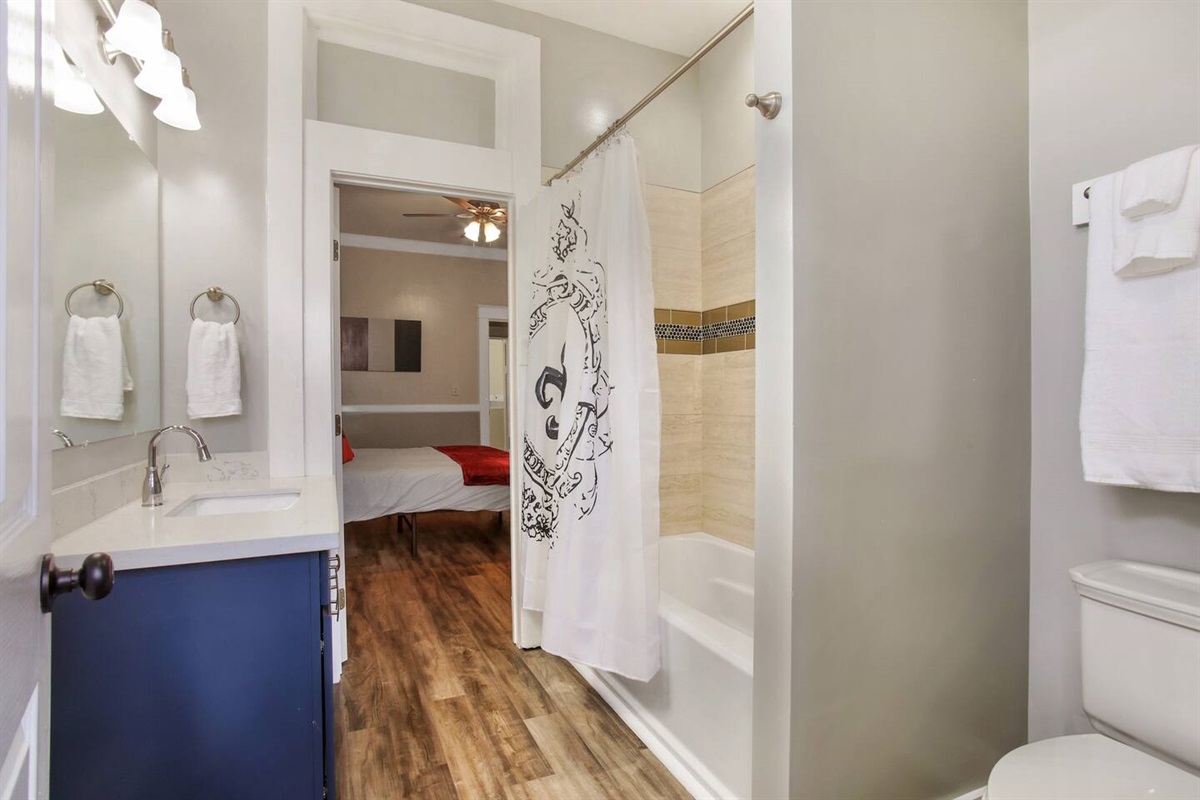 Bathroom 1.  Shared between bedrooms 1 & 2. Shower/tub.