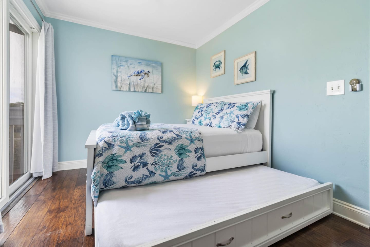 Find Queen bed with a trundle underneath &mdash; flexible for families with kids who want their own space without their own room.