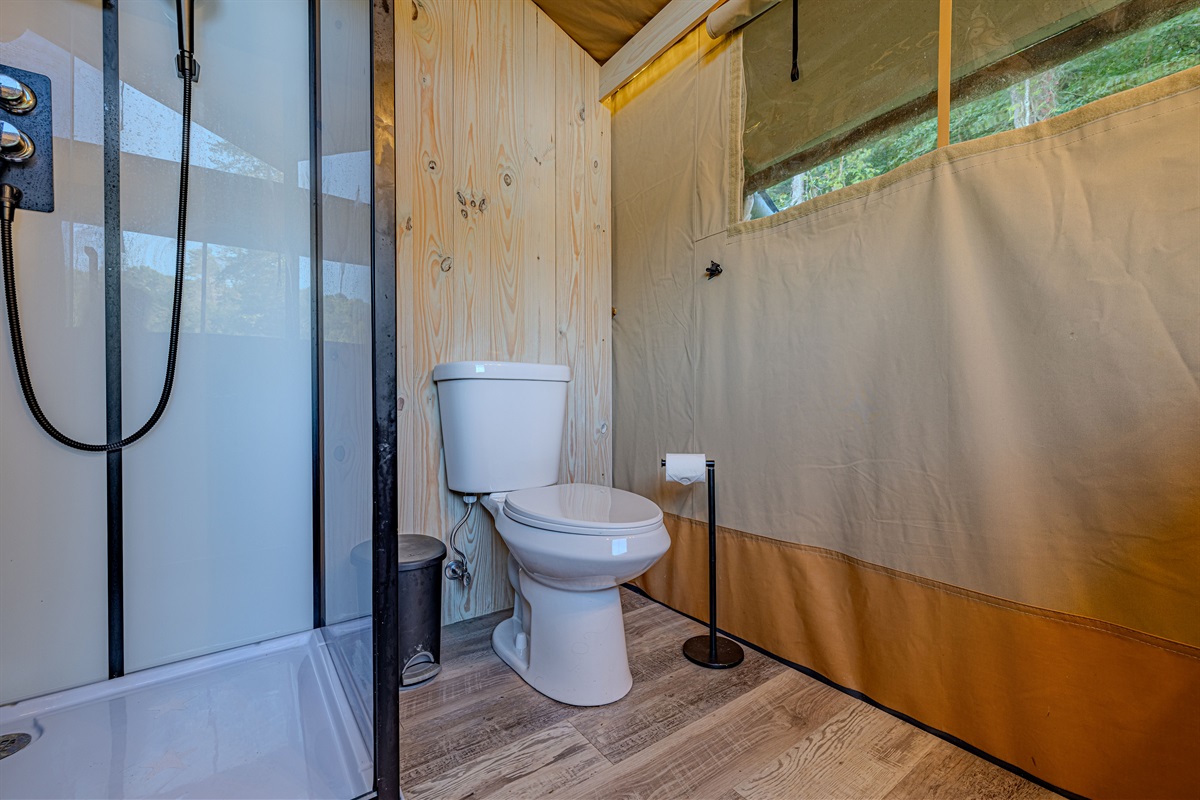This is glamping, not roughing it. Enjoy the simple luxury of stepping off your wooden floor onto a modern bathroom floor. No sharing, no fuss, just comfort.