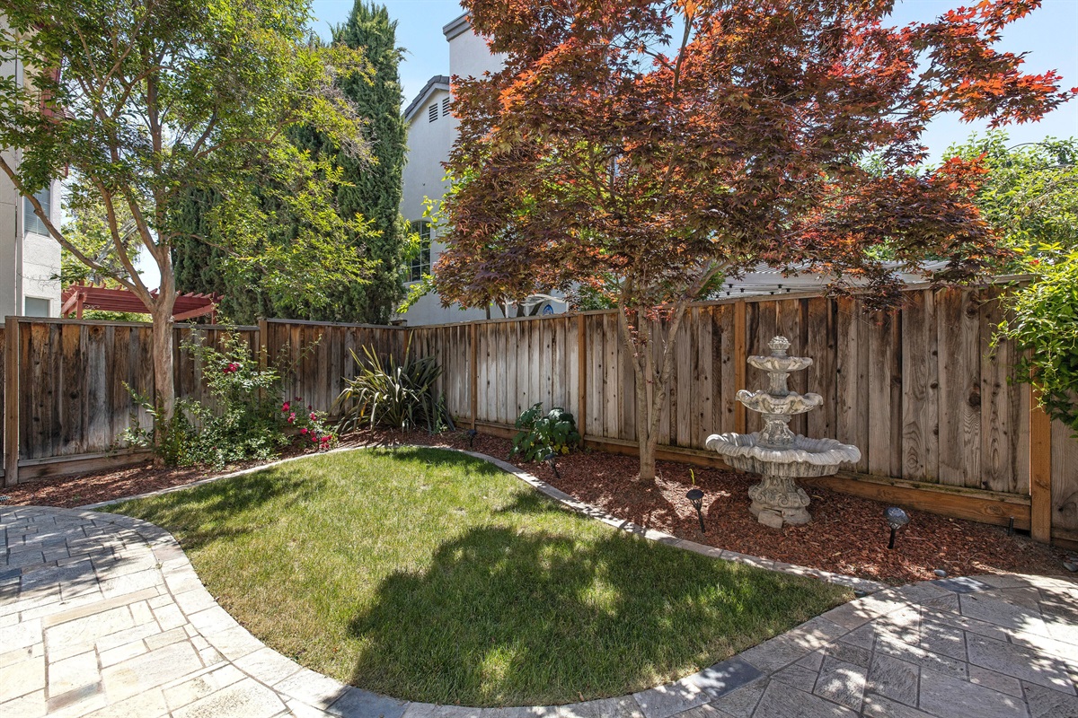 Enjoy the day or night in our spacious backyard