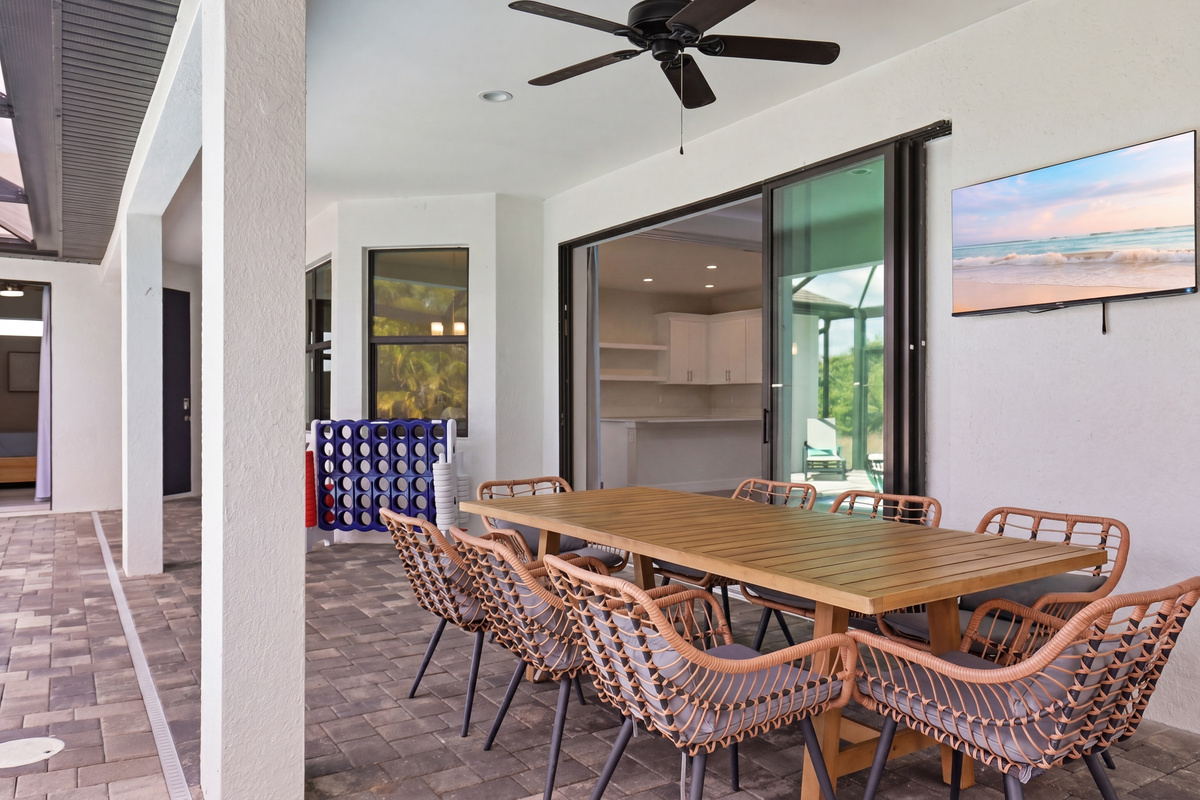 Main lanai with TV, grill and games.