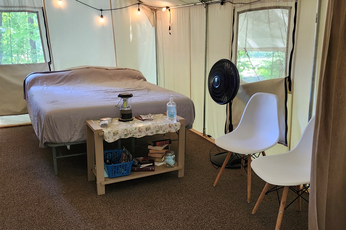 Queen bed w/ pedestal fan
