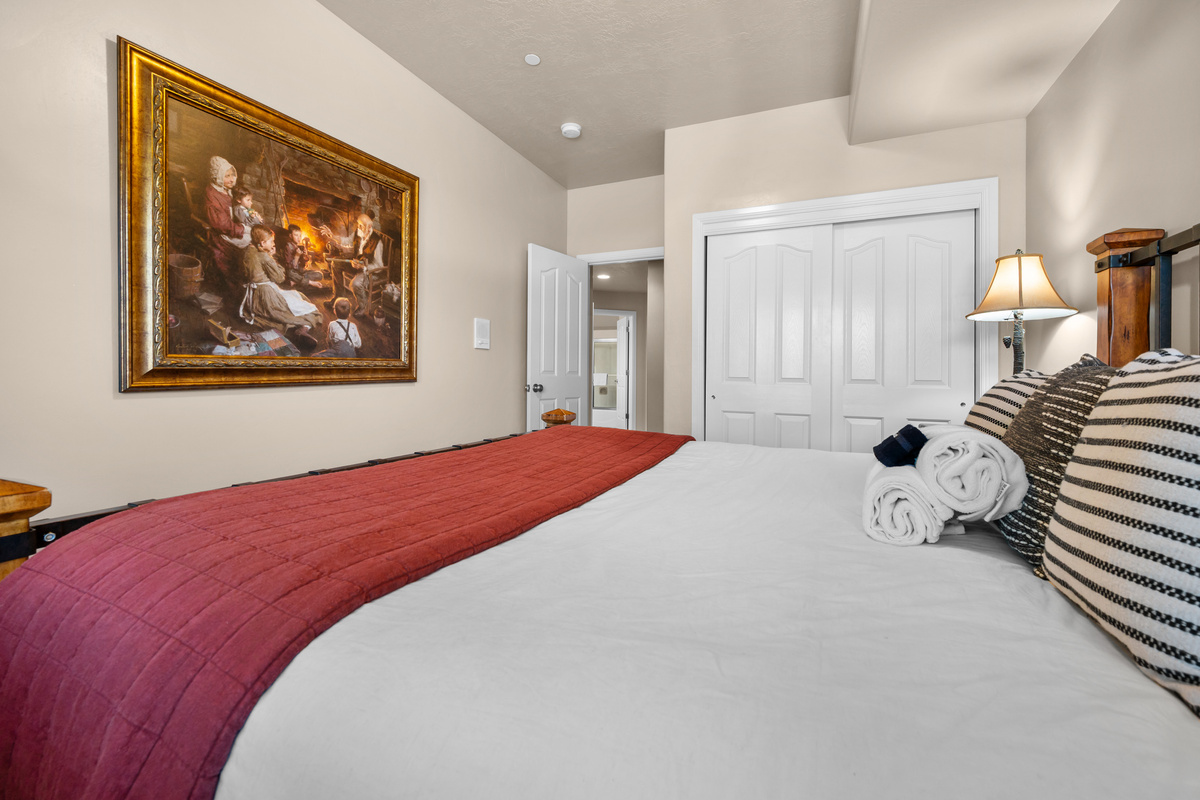 Cozy guest bedroom offering comfortable accommodations for additional guests.