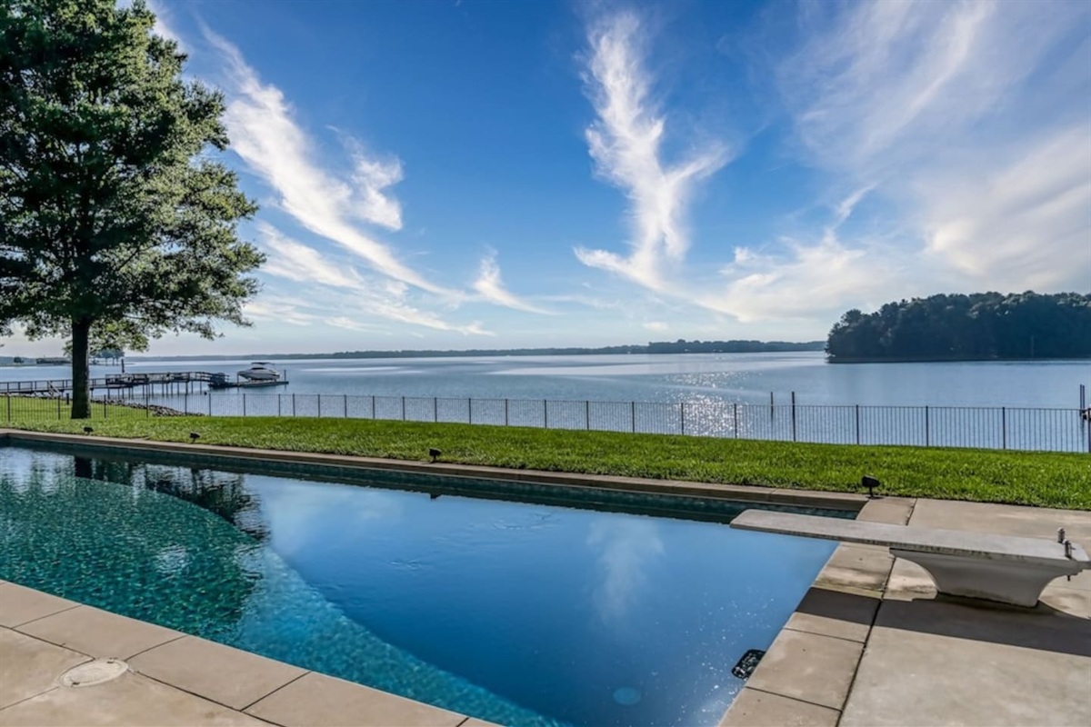 Amazing views of Lake Norman from patio, pool and hot tub, also great island out nearby to paddleboard to and from.