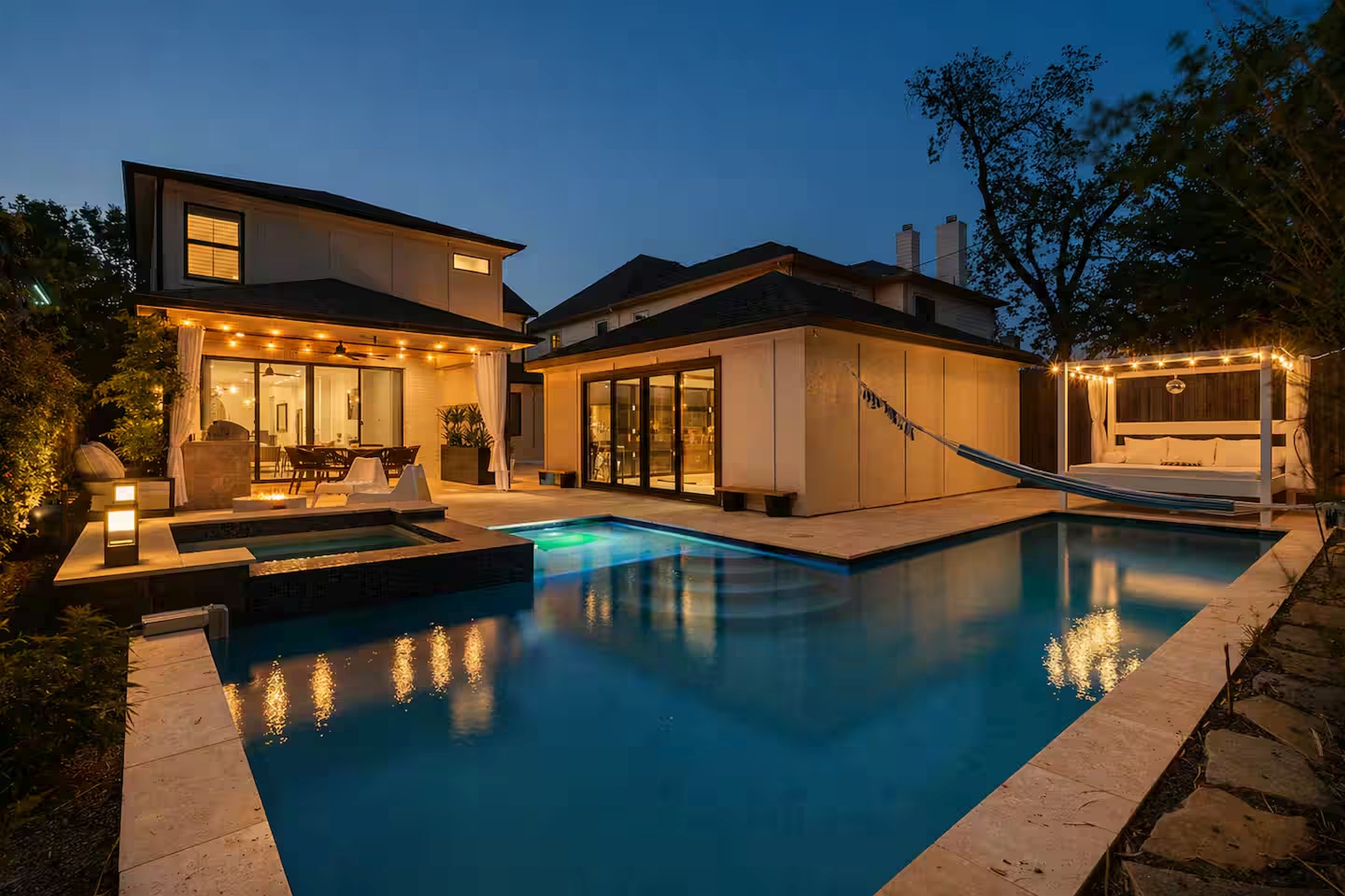 Resort-style pool with stunning evening ambiance