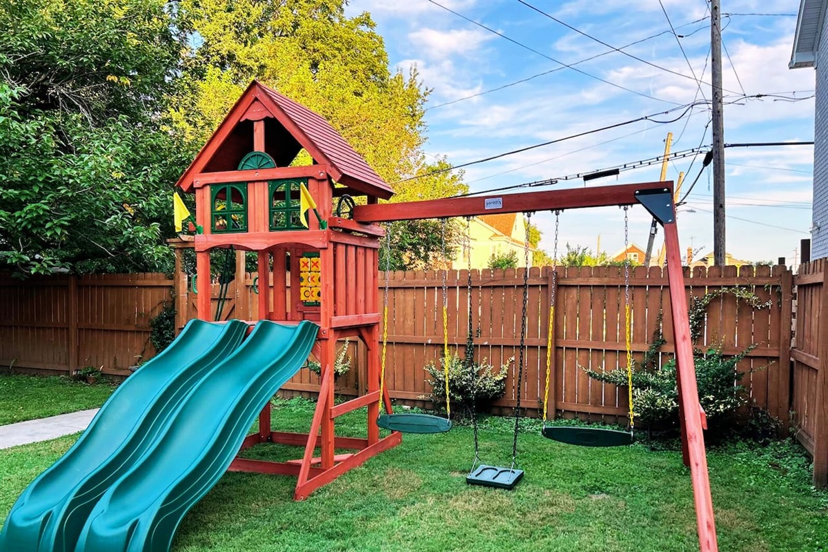 Enjoy the private fully fenced back yard with newly installed swing set playground. 