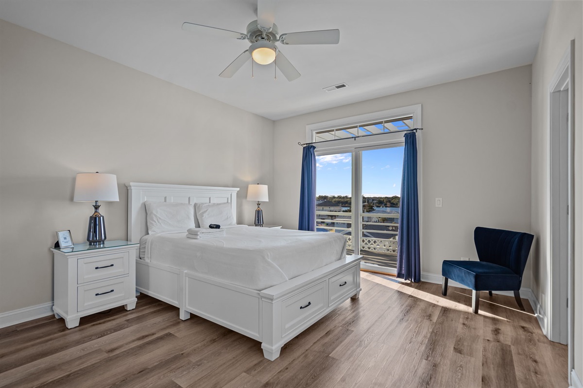 3rd floor queen bedroom #5 with balcony access and intracoastal waterway views