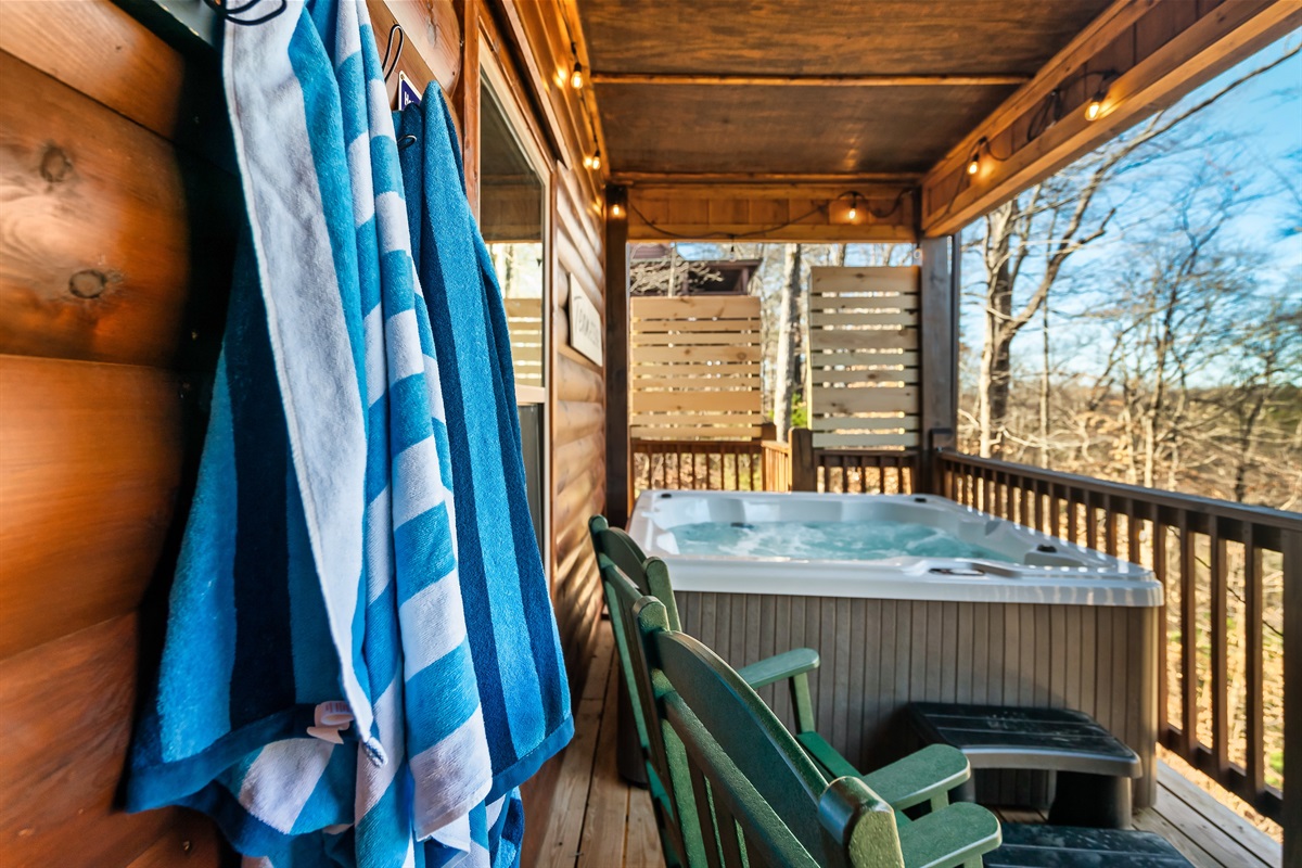 [Hot Tub / Lower Level] Enjoy the hot tub in privacy as you see the mountains in the winter and green trees in the summer