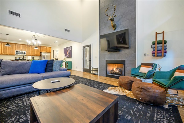 Curl up by the fire in style — modern design, plush seating, and cozy details that make this living room feel like pure mountain luxury
