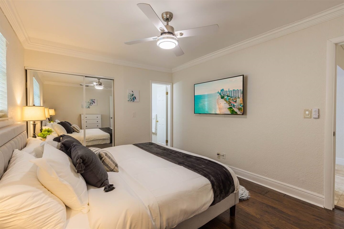 The 1st Bedroom has a King-sized bed, Smart App TV and large white dresser. It also has an en-suite bathroom with shower and new vanity. There is a great walk-in closet with a pack n play and sheets as well as inflatable mattress.