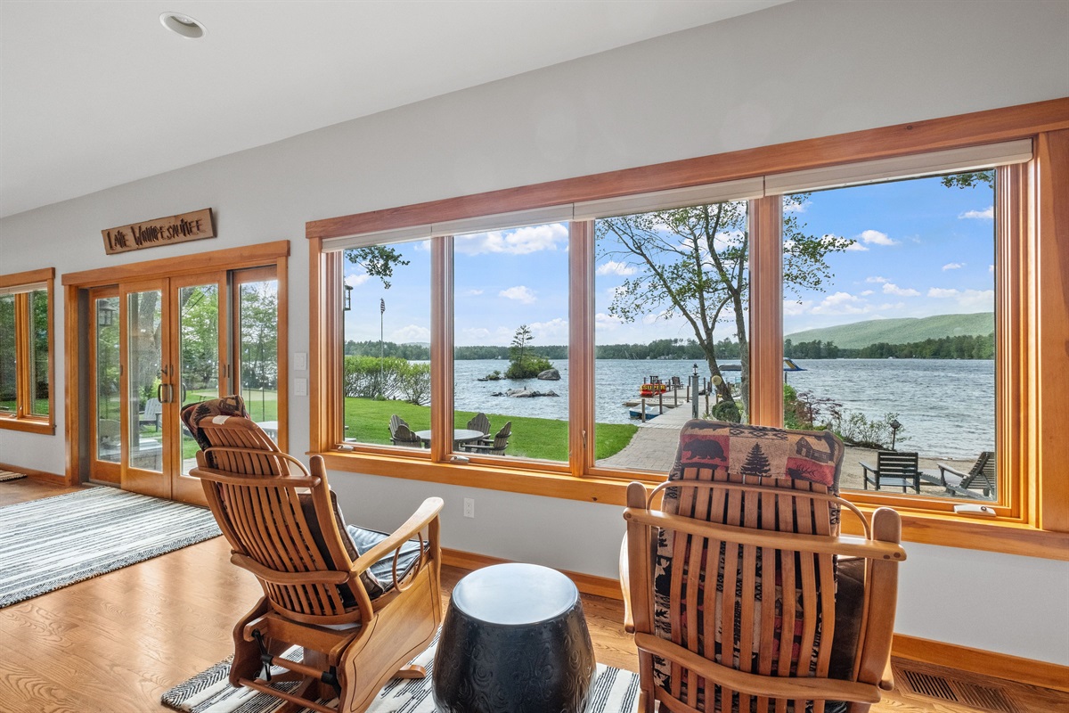 Sunroom overlooking lake and mountain views, great for watching guests on the beach and enjoying the sunsets.