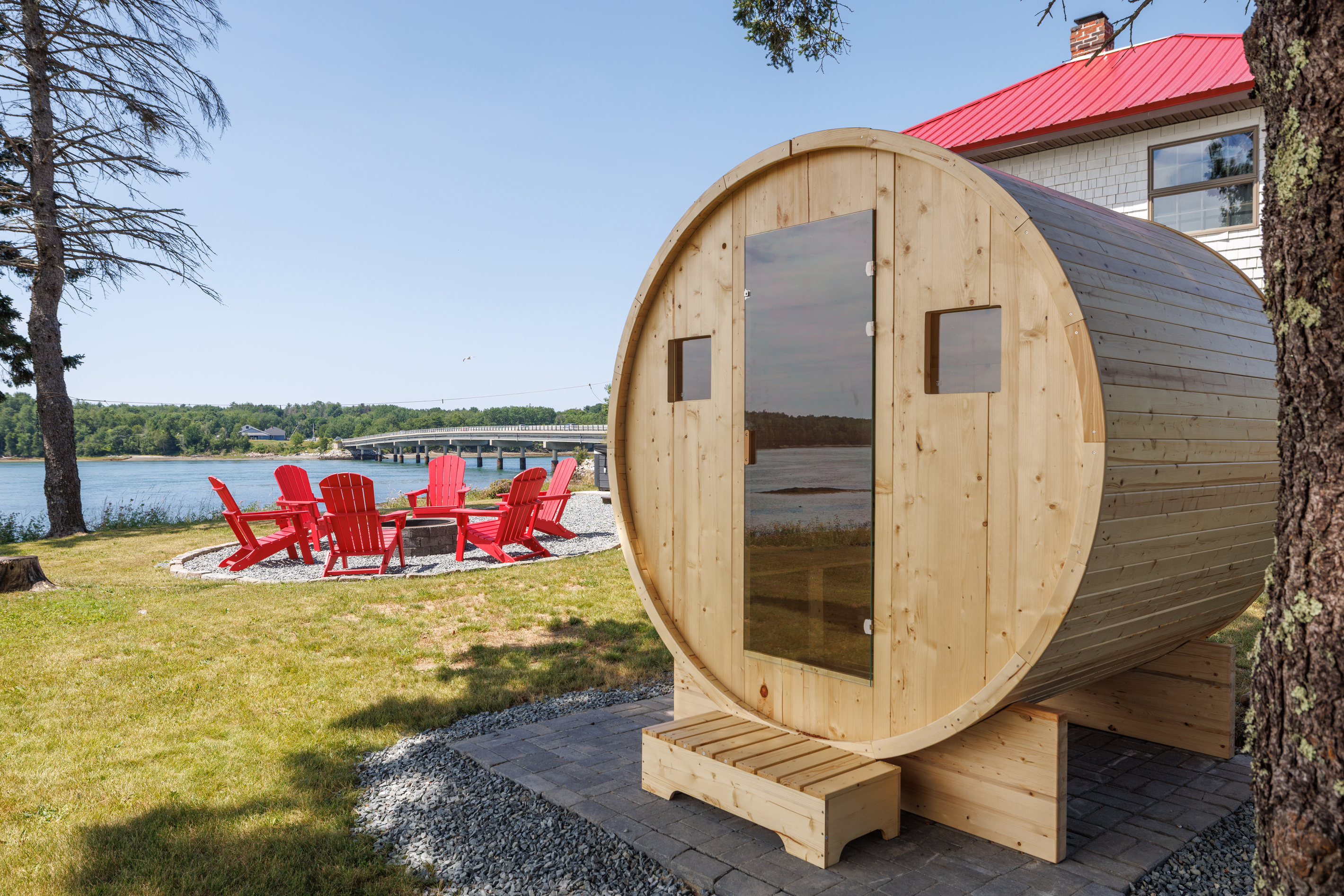 Sweat it out in the barrel sauna, then step straight into the cool tidal bay — the Scandinavian ritual, Maine edition.