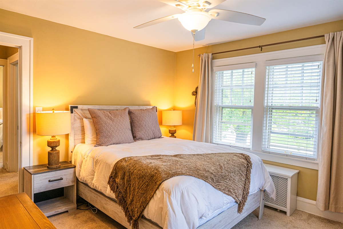 Bedroom #1: Beautifully decorated primary bedroom, with a Serta mattress and low-profile box spring.