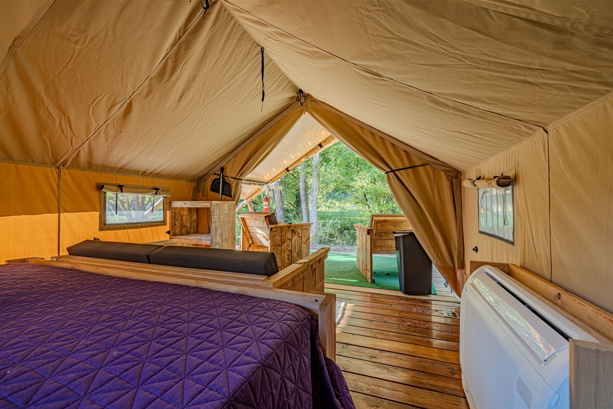 The perfect view awaits you at the entrance. Wake up to the serene forest backdrop framed perfectly by your tent opening.