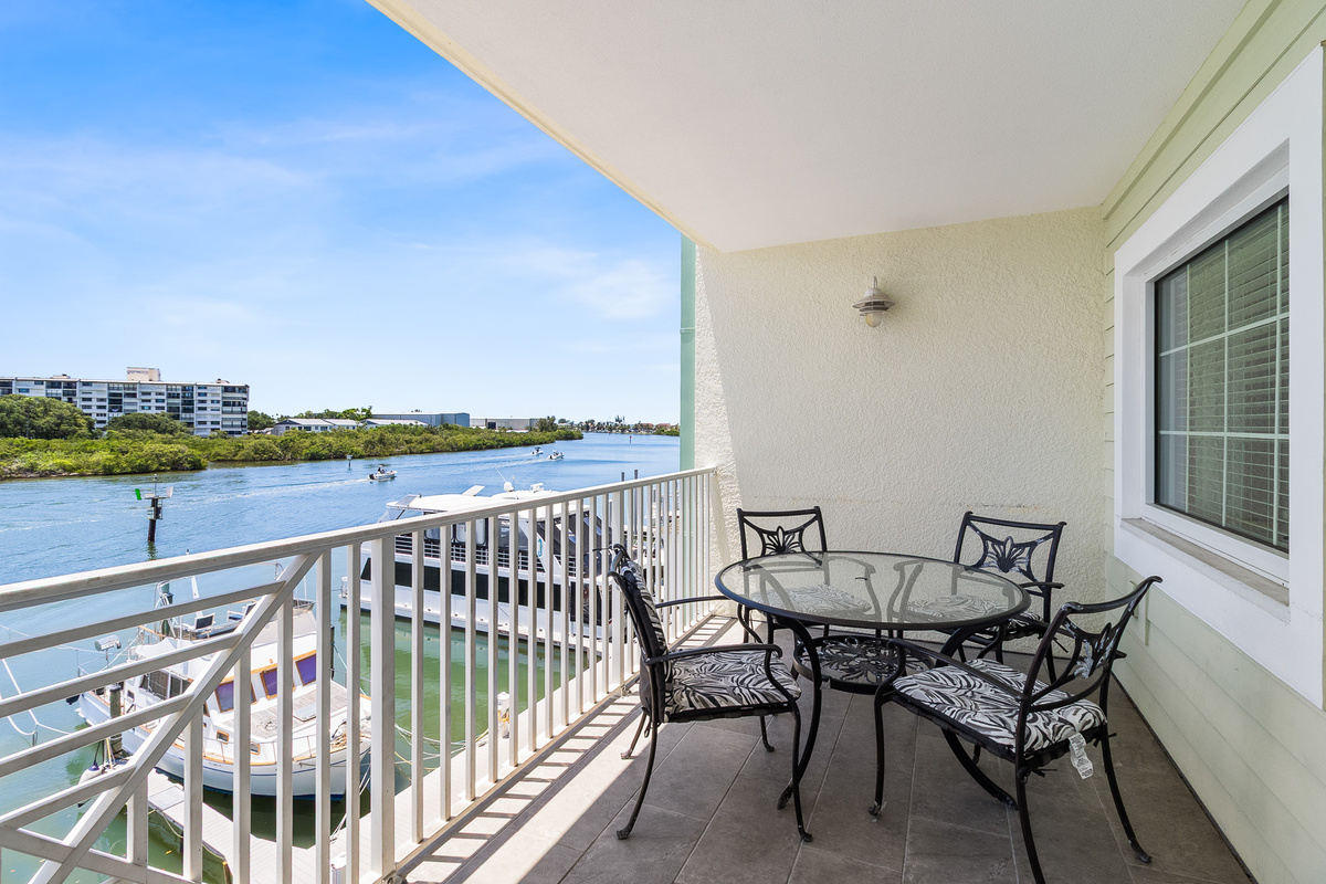Back Balcony, Private, Waterfront-facing Balcony with awesome views of the Intracoastal waterway, which leads to the Gulf of Mexico/America.  Dine waterfront!
