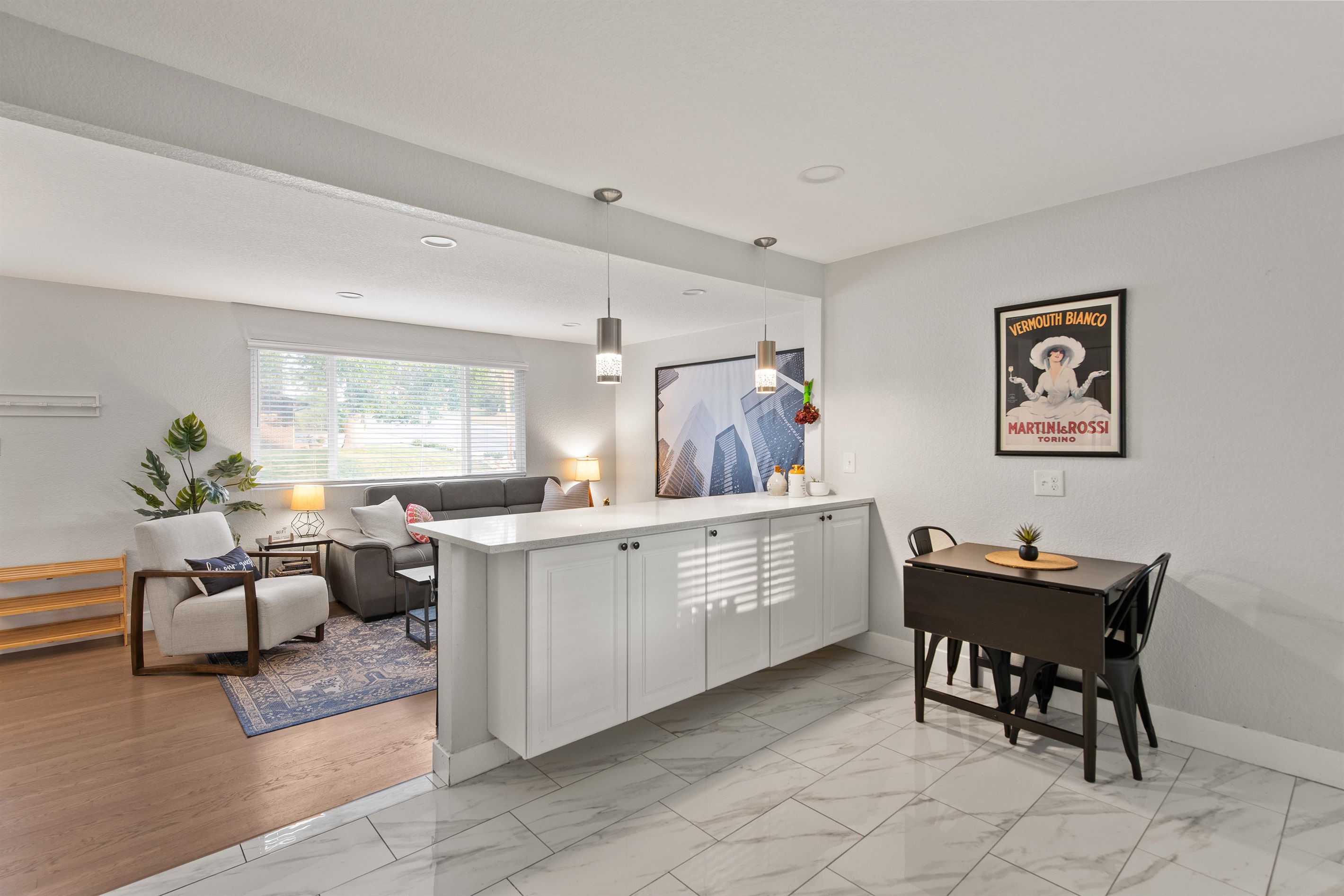 Bright open floor plan with dining and living spaces