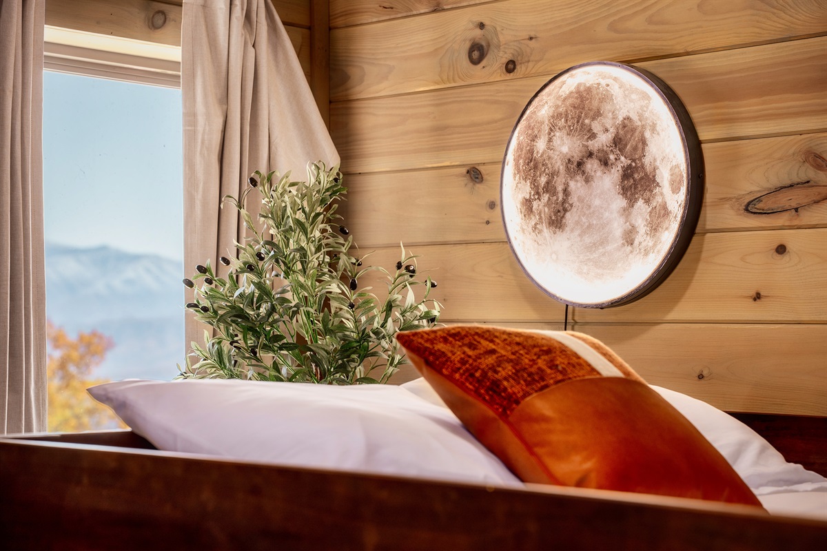 Top bunk magic with a moon lamp glow. Kids’ favorite sleep spot.
