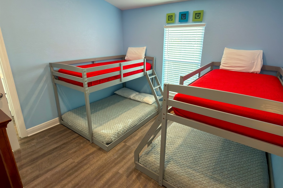 With sleeping space for multiple guests, this lively bunk room is made for movie nights, card games, and memorable family vacations.