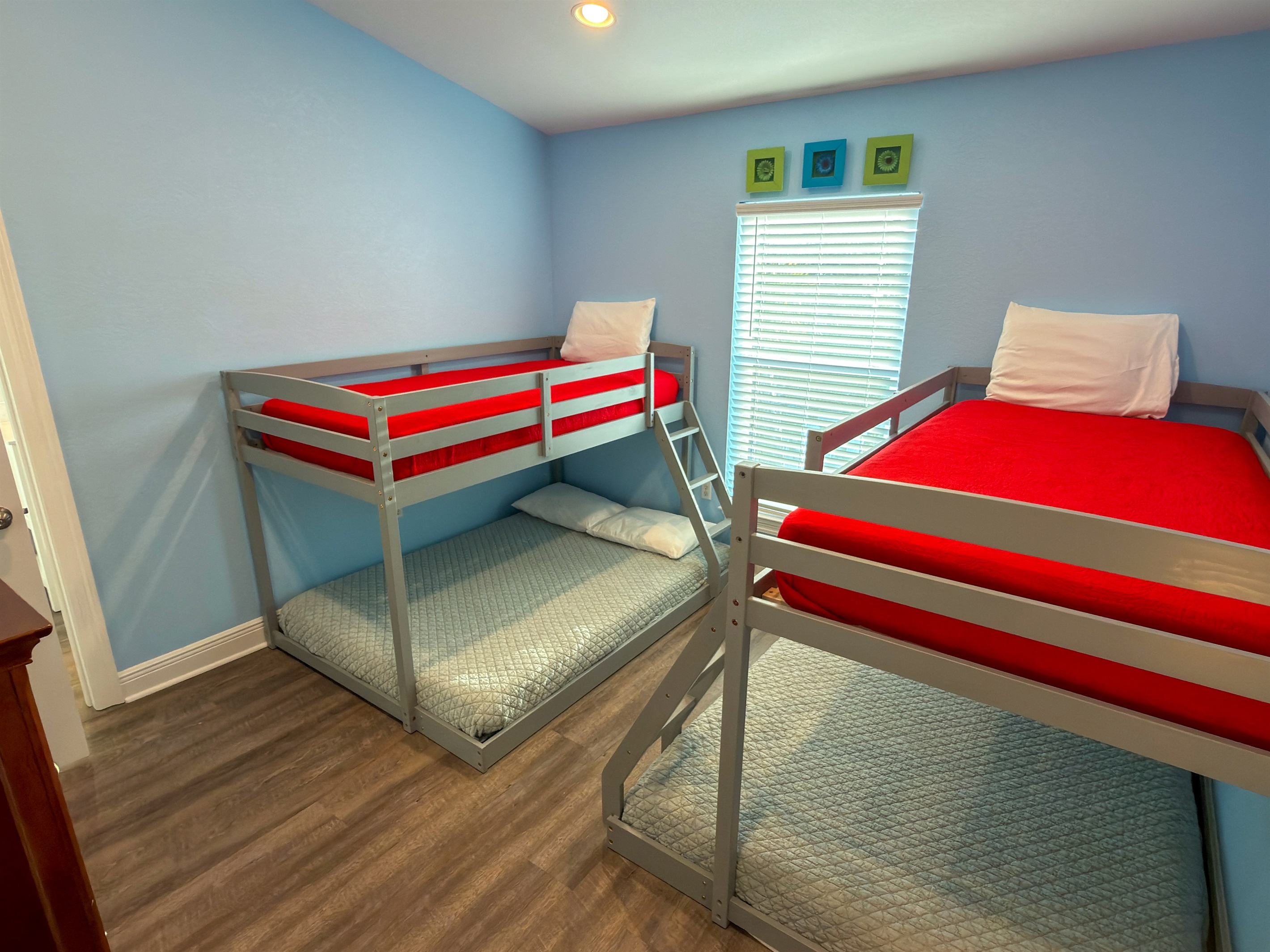 With sleeping space for multiple guests, this lively bunk room is made for movie nights, card games, and memorable family vacations.