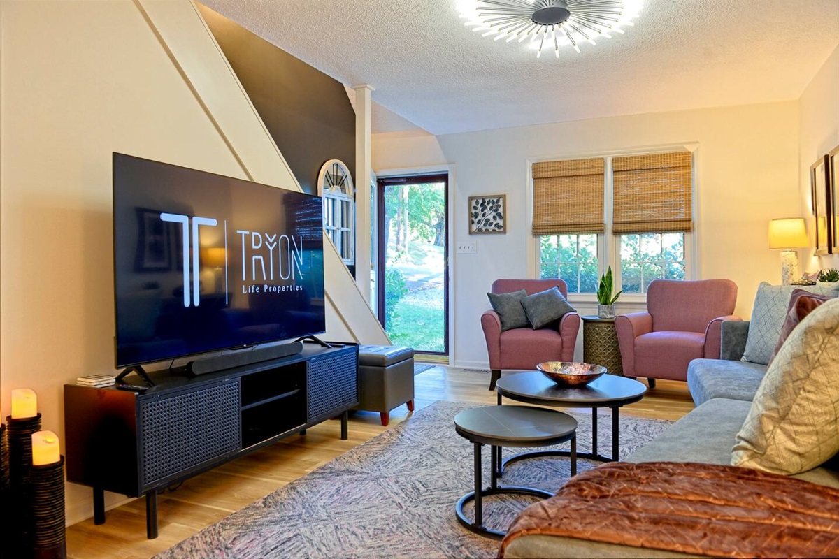 The upstairs Living Room has a 65" TV you can watch all your favorite shows on while away! 