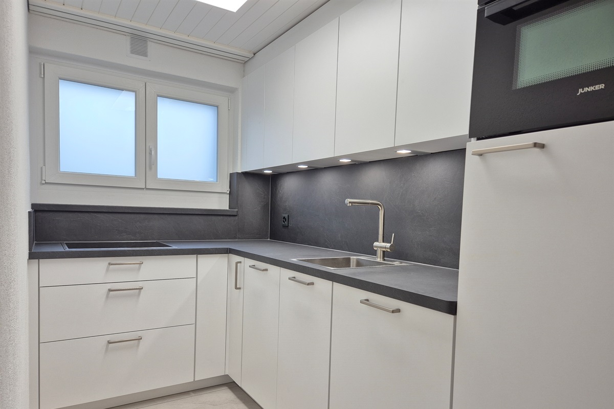 Fully equipped kitchen with washer, dryer, dishwasher, oven, fridge, microwave, coffee maker, kettle, toaster and induction hob