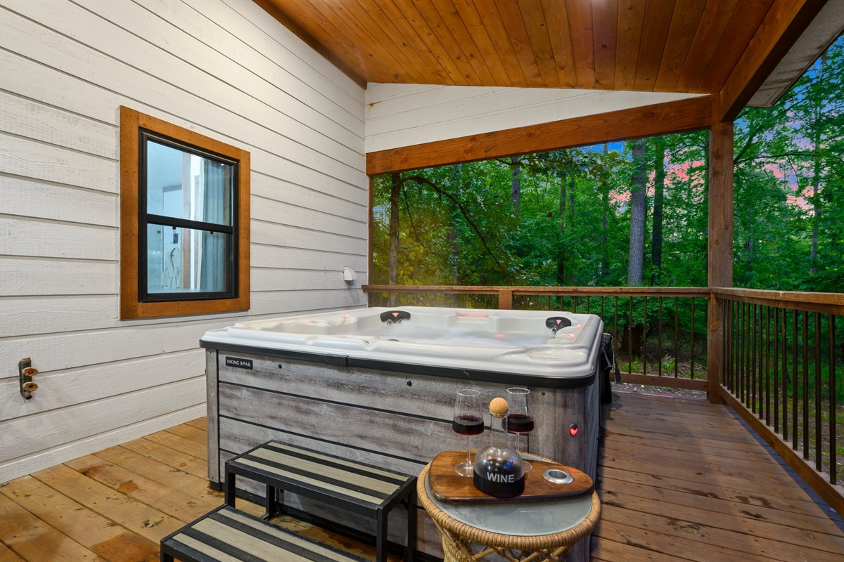 Hot Tub Retreat: Unwind under the stars in this luxurious hot tub surrounded by nature!