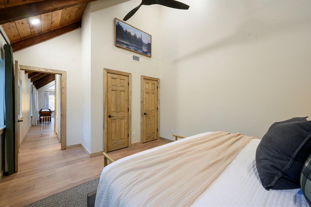 Comfortable king bedroom just steps from the game loft and main living area.