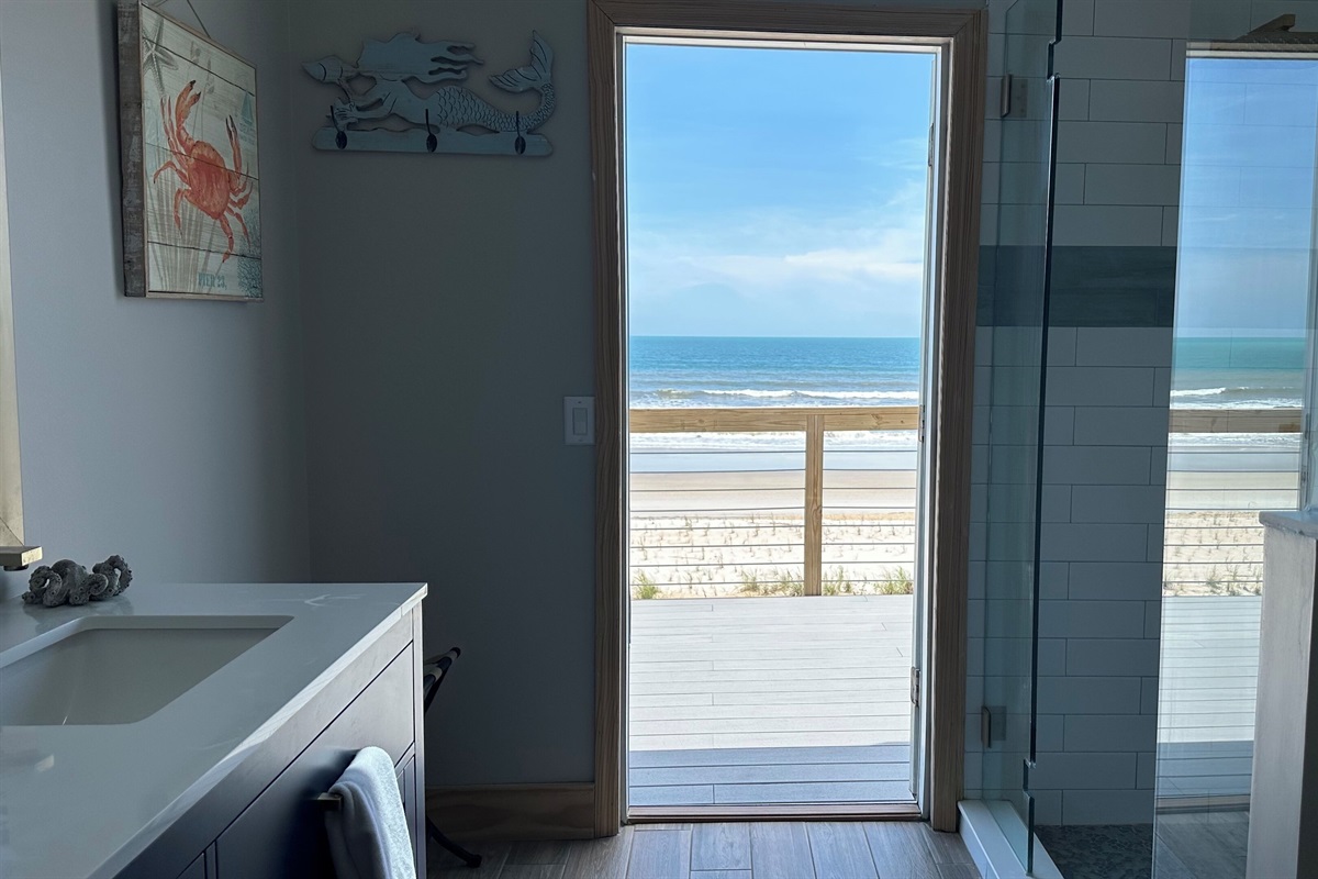 Come in from the beach and rinse off through the hallway bathroom