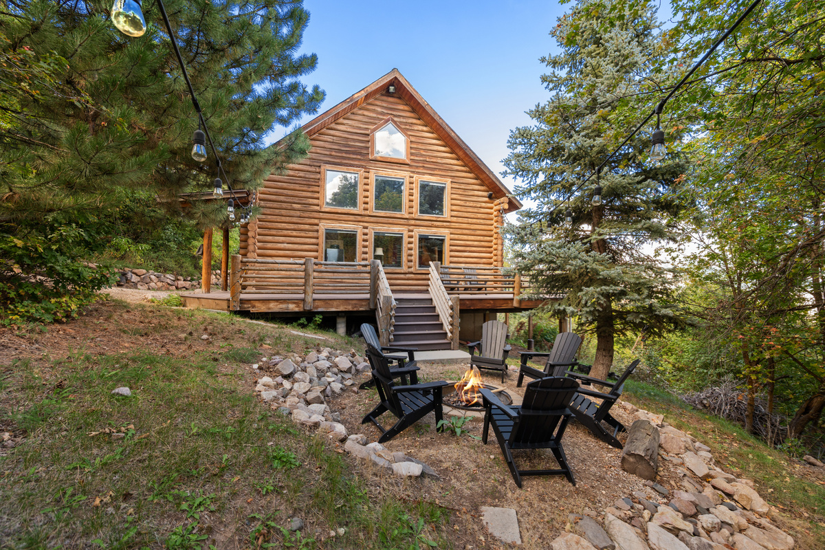 Rear exterior view of Nordic by Nature overlooking the private fire pit gathering space.