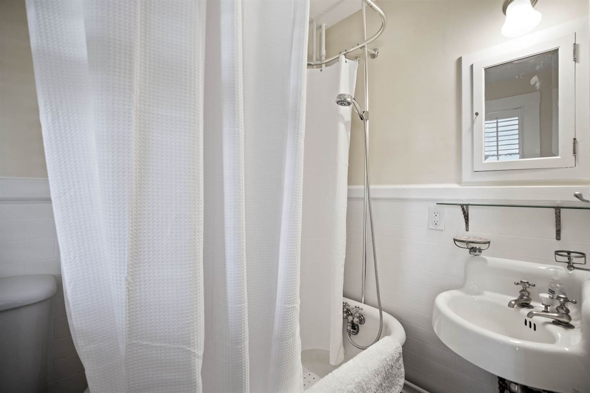 Full bath with shower and tub