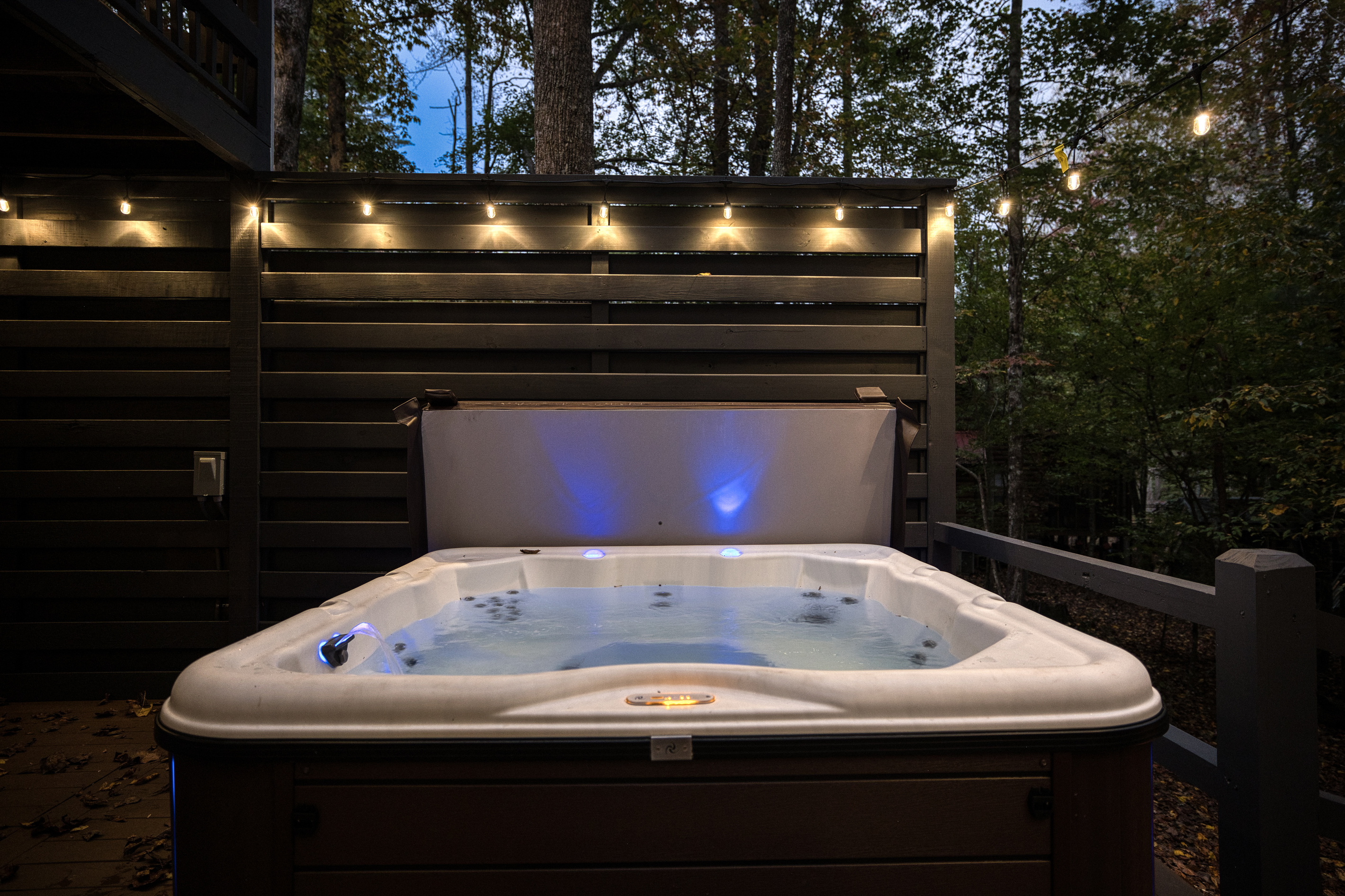 Private hot tub at night.