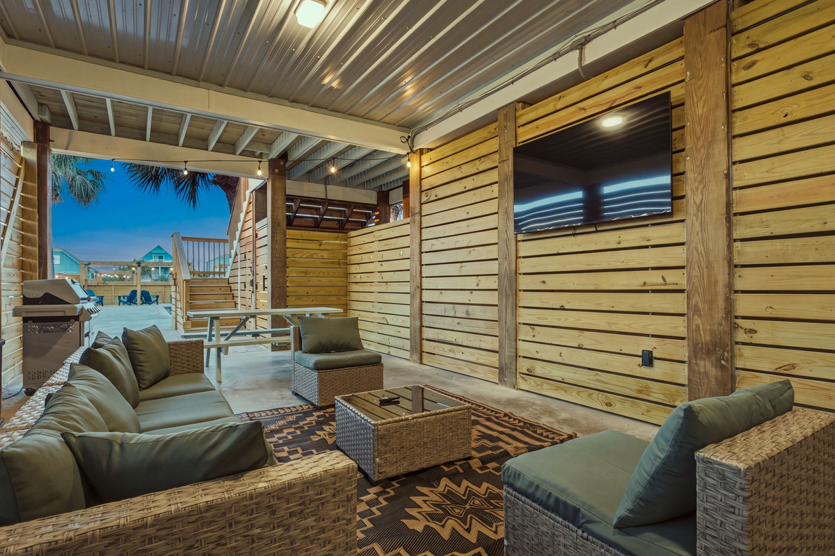 Cozy outdoor spaces extend the fun after sunset.
