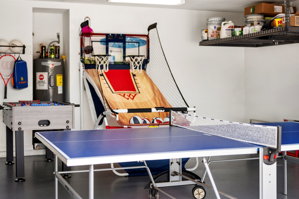Ping pong, foosball, arcade basketball. beach chairs, and bikes galore—your garage is packed with fun