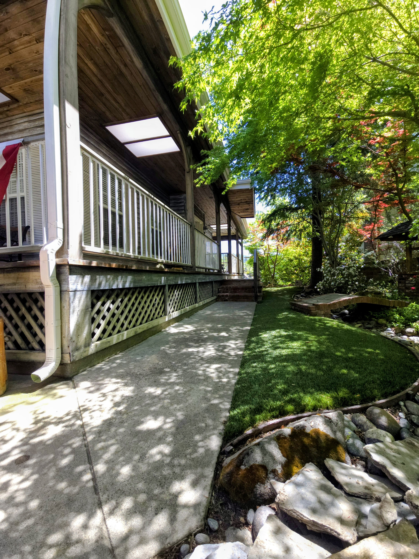 Walkway to the front door and to the gate leading to the backyard
