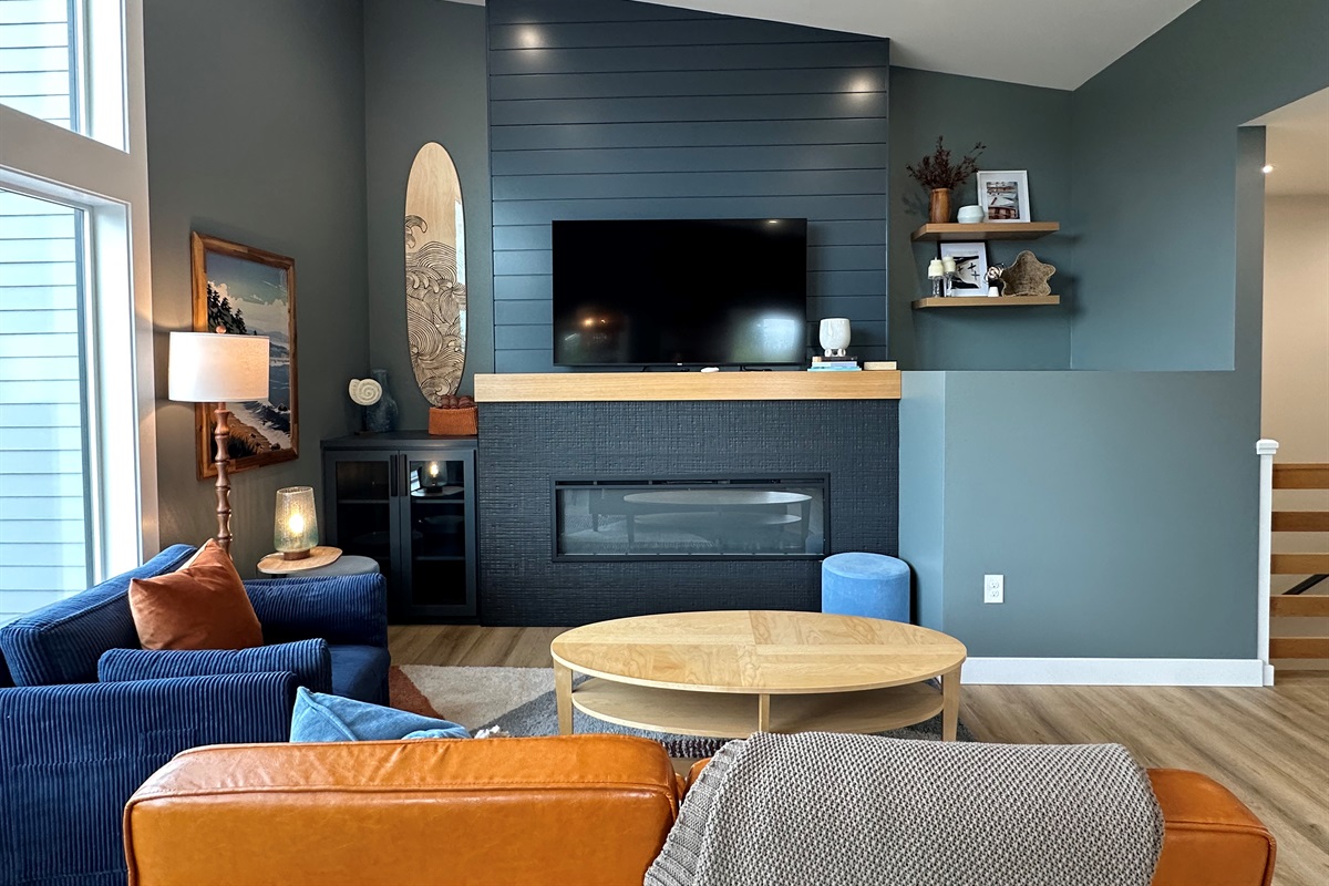 Villa B living room — settle in, pour something cold, and let the day come to you.