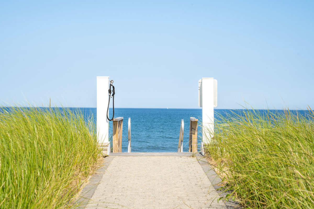 The ocean is waiting—step through the beach access and onto the sand for a day by the shore.