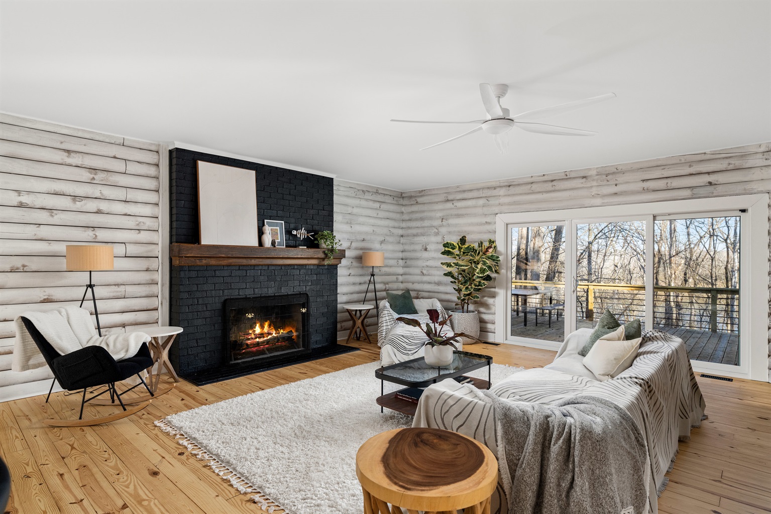 Living Room: Elegant space with a fireplace and stunning views for a relaxing retreat!