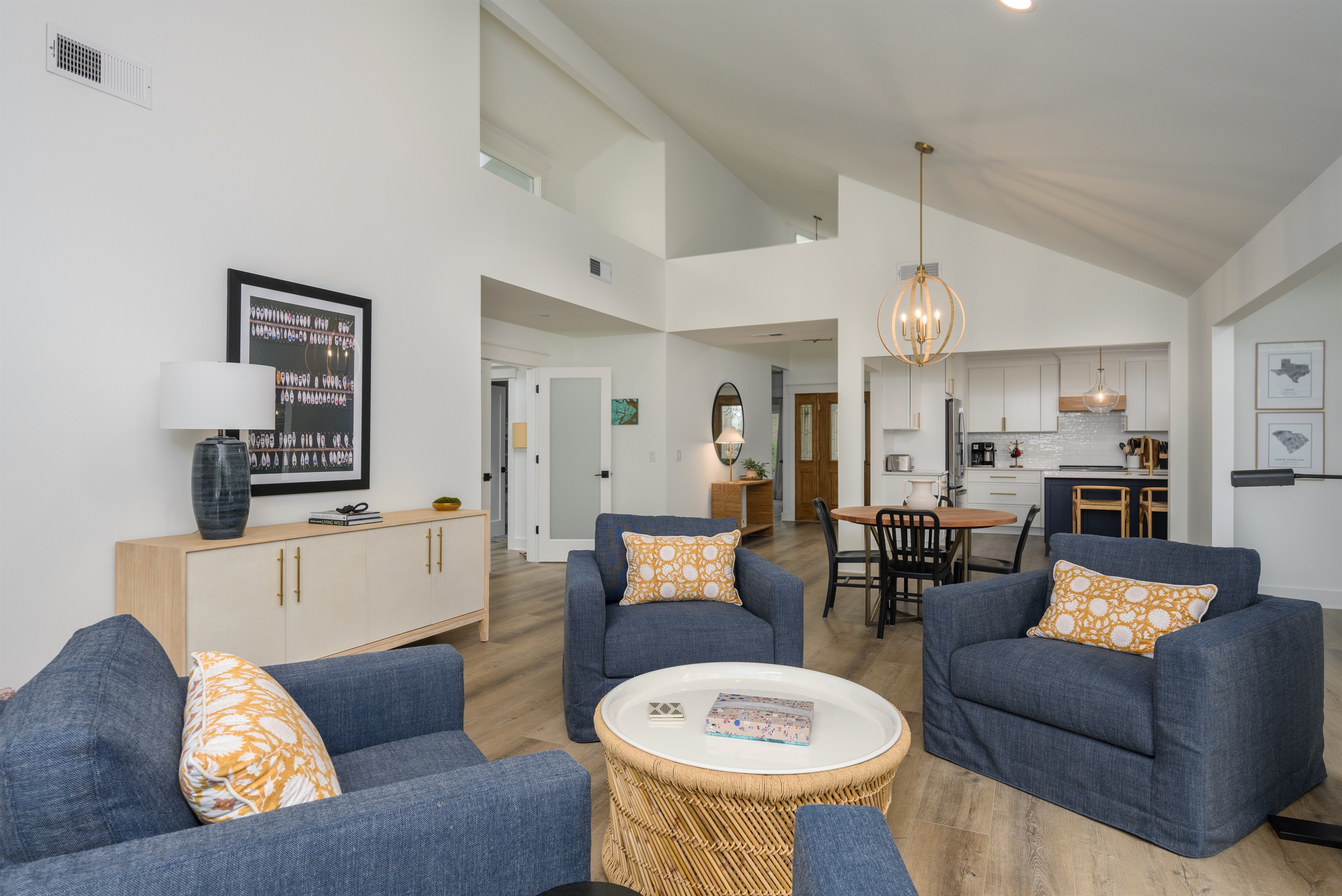 Living room view to foyer and kitchen