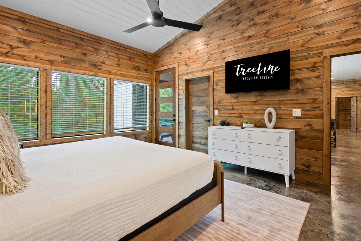Bedroom 2 includes TV and dresser for added comfort.