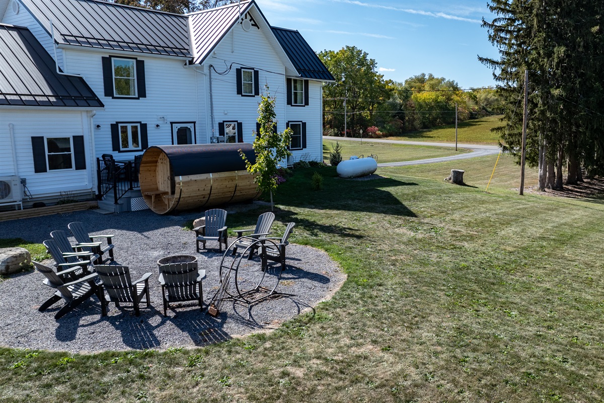 Spacious backyard with a sauna and patio — ideal for morning coffee, family fun, or evening relaxation
