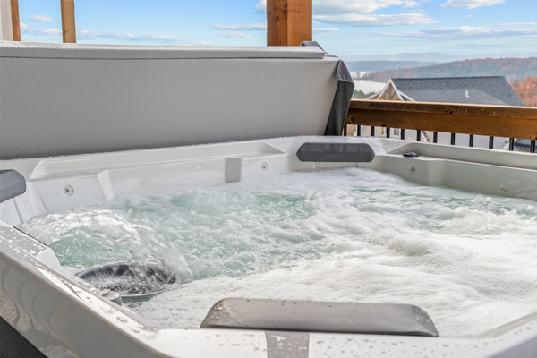 Wellness porch. 7-person Hot Springs Hot Tub overlooking our quiet cove on Table Rock Lake.