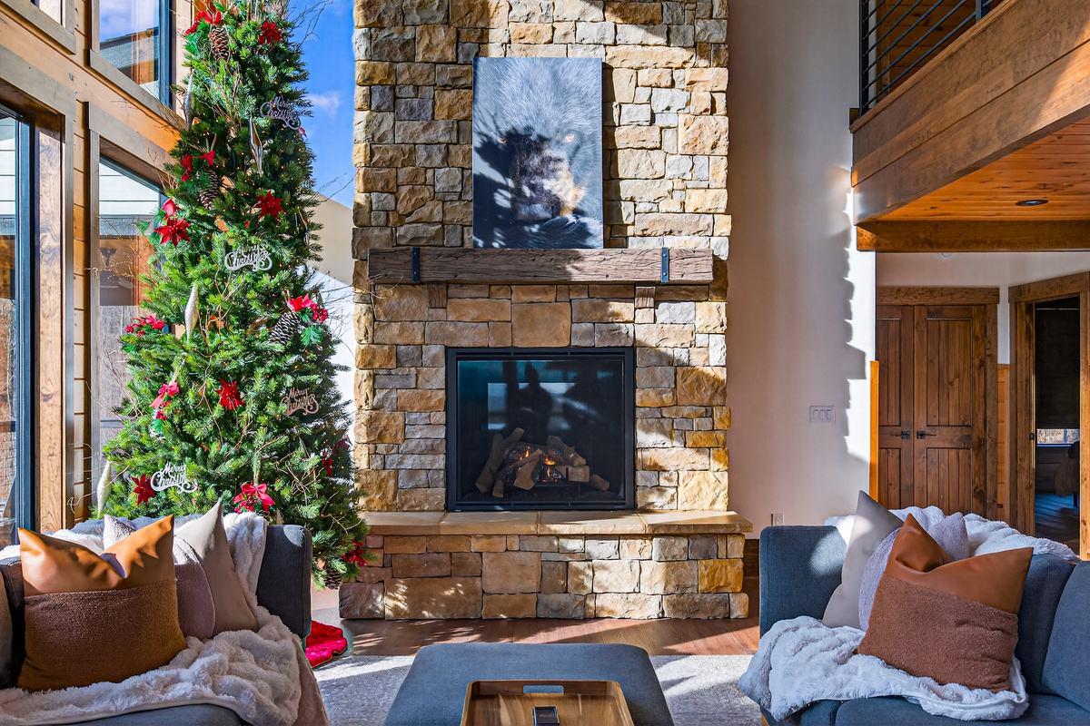 Gather around the twinkling Christmas tree and enjoy the warmth of the Smokies. This inviting living space is the perfect backdrop for holiday memories, family traditions, and cozy winter evenings.