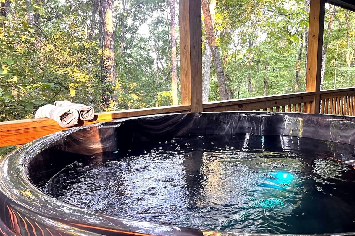 Your personal hot tub among the trees.