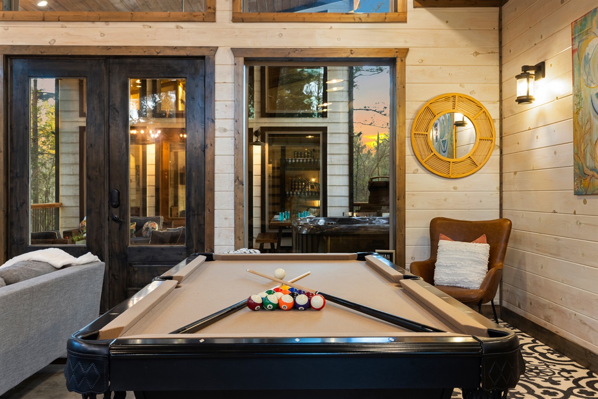 A little friendly competition with pool. Laughter and laid back moments surrounded by the forest.