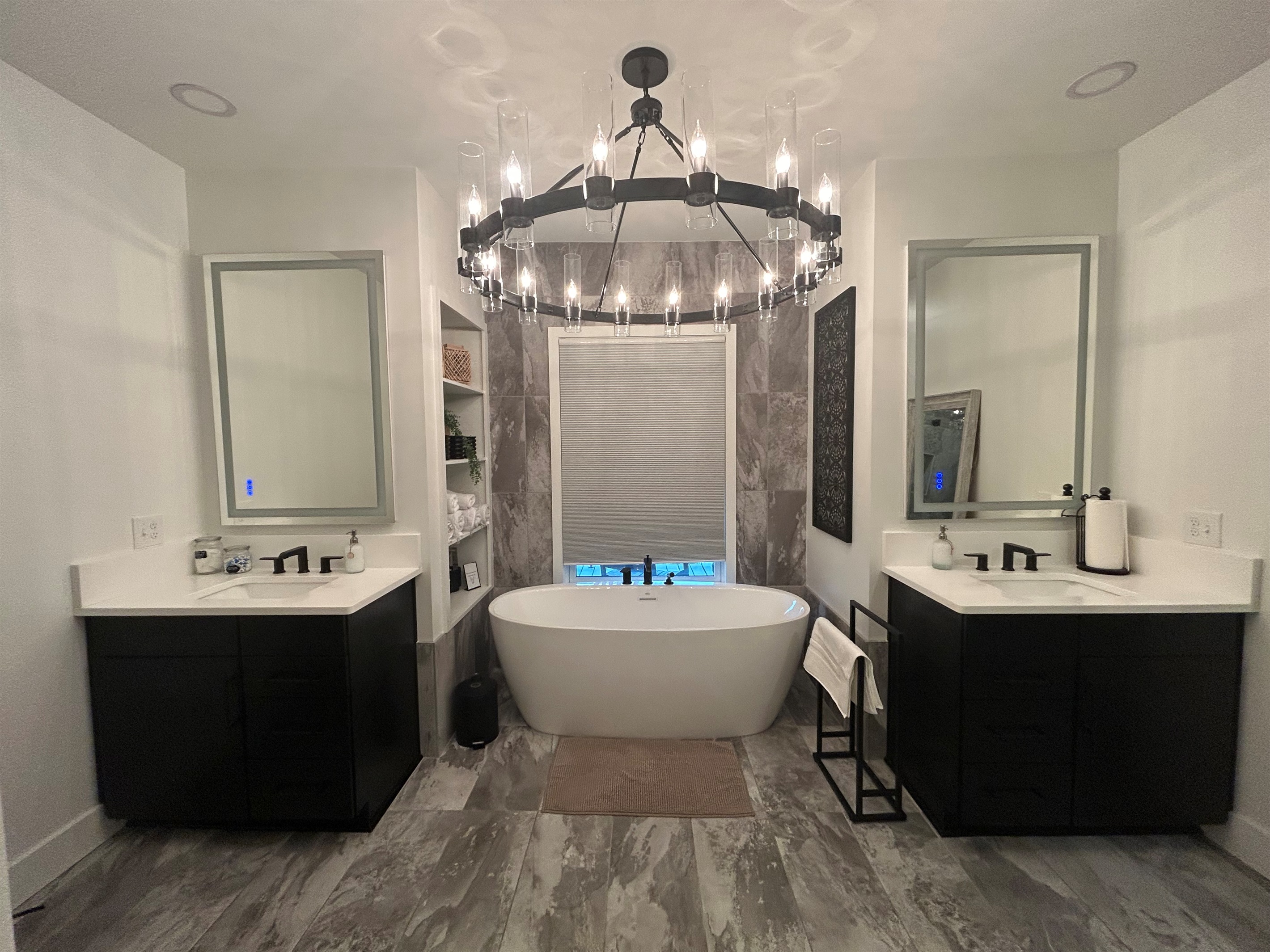 Unwind in this elegant freestanding soaking tub perfect for a peaceful spa-like escape