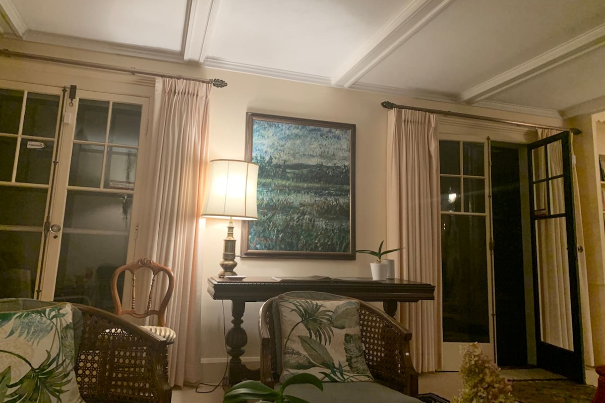Living room with French doors leading to the side porch 