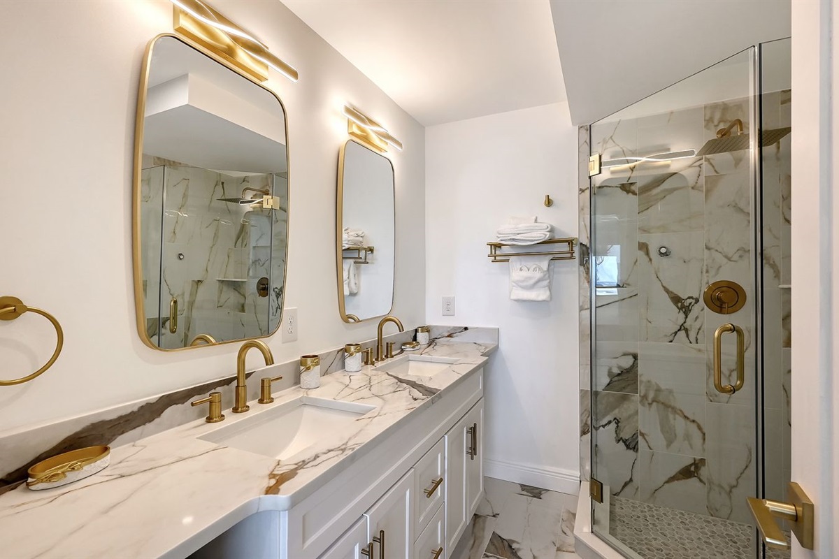 Master bath with dual sinks and walk-in shower