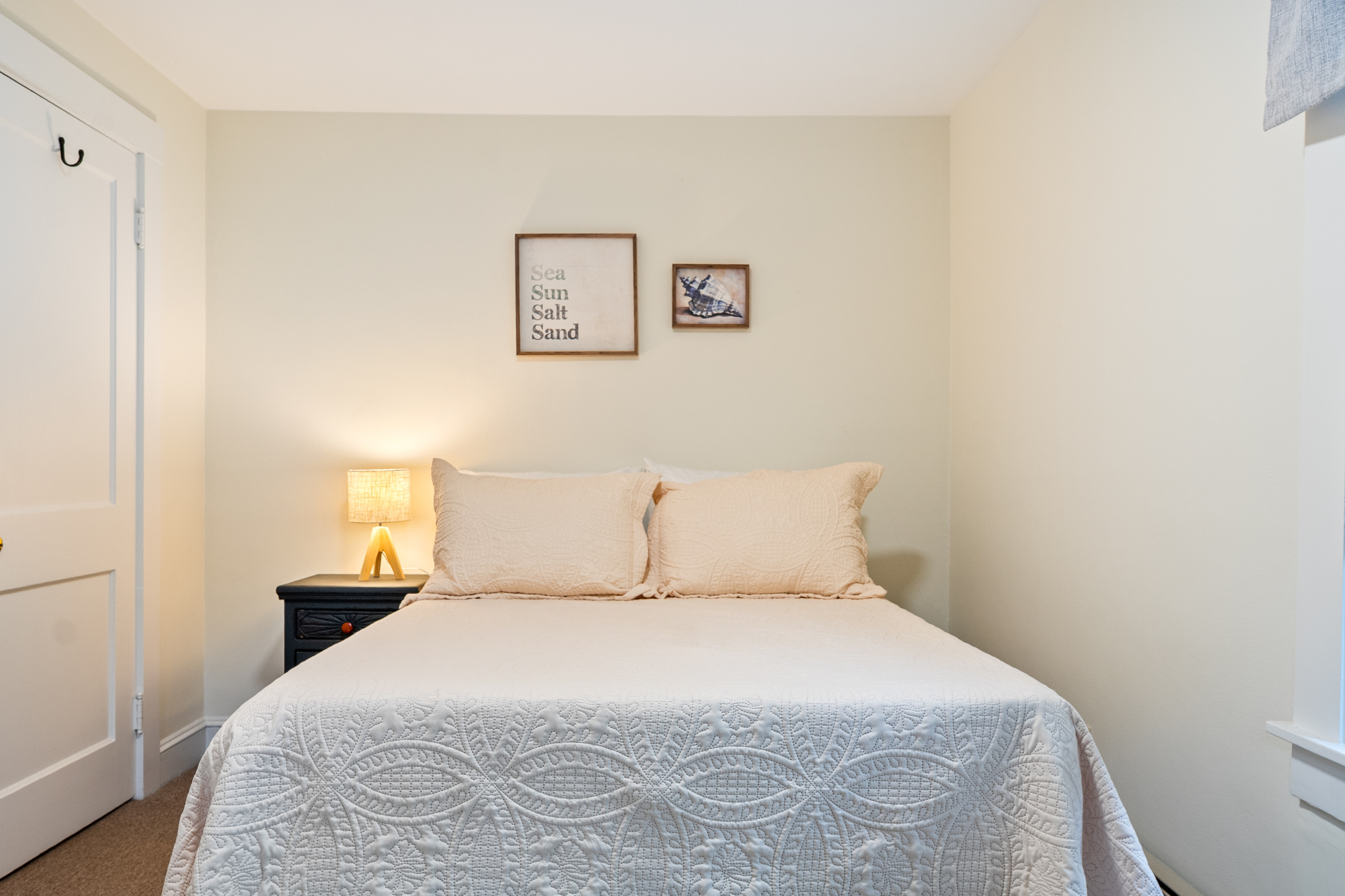 From the moment you walk through the door, the quiet palette of this room invites a slower pace. Under the warm glow of the lamp, the premium full memory foam mattress offers a peaceful, supportive place to rest up for another Maine adventure.