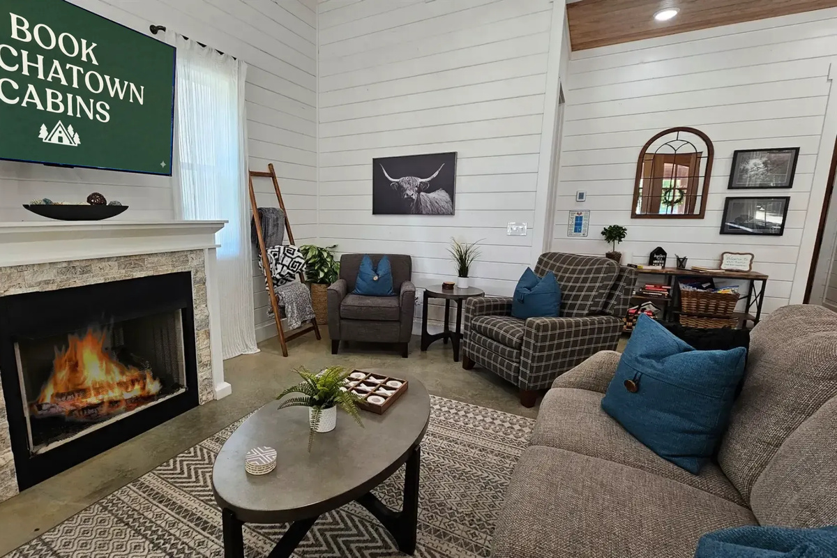 Indoor living room with fireplace and plush seating for relaxing nights in